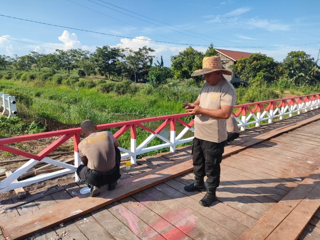 JEMBATAN MERAH PUTIH POLRES KUTIM RAMPUNG 100 PERSEN